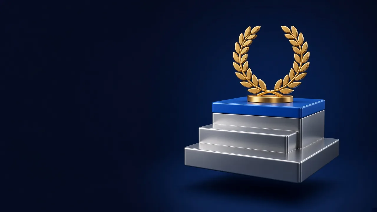 A gold laurel wreath standing on the blue top step of a silver podium